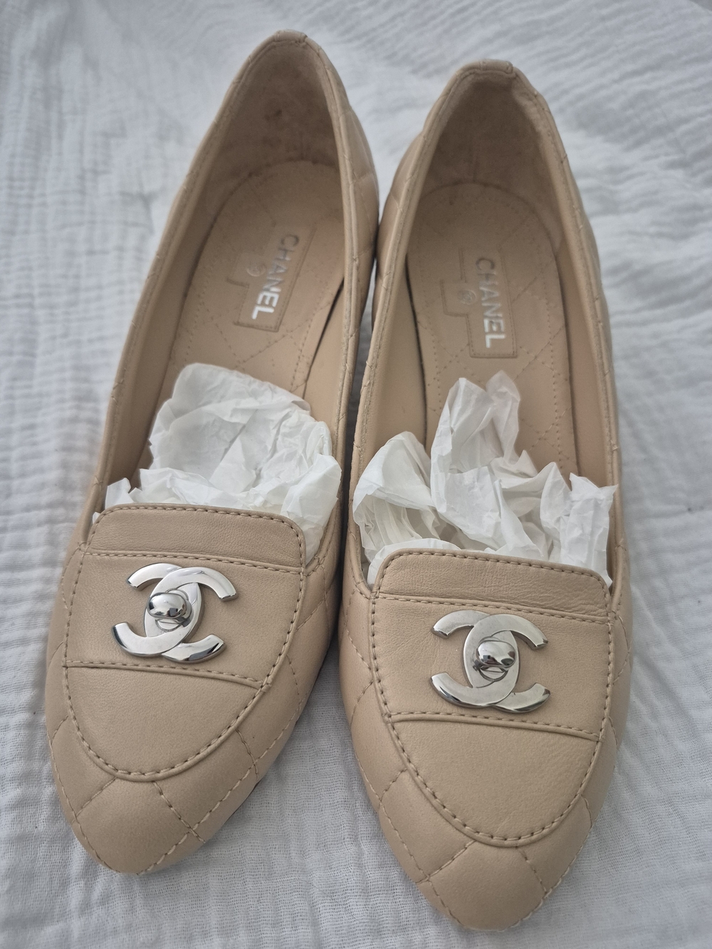 CHANEL Nude Quilted Leather Pointed-Toe Loafers with Silver CC